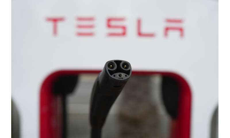 Electric vehicle maker Rivian to join Tesla charging network as automakers consider company's plug