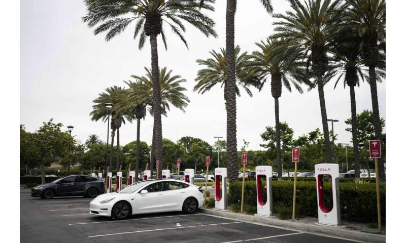 Electric vehicle maker Rivian to join Tesla charging network as automakers consider company's plug