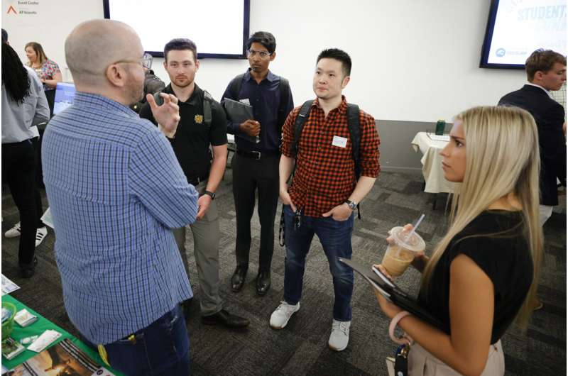 College students speak with representatives of local tech companies during the Startup Student Connection job fair, Wednesday, March 29, 2023, in Atlanta. For the thousands of workers who'd never experienced upheaval in the tech sector, the recent mass layoffs at companies like Google, Microsoft, Amazon and Meta came as a shock. Now they are being courted by long-established employers whose names aren't typically synonymous with tech work, including hotel chains, retailers, investment firms, railroad companies and even the Internal Revenue Service. Credit: AP Photo/Alex Slizt Still hiring: Big Tech layoffs give other sectors an opening