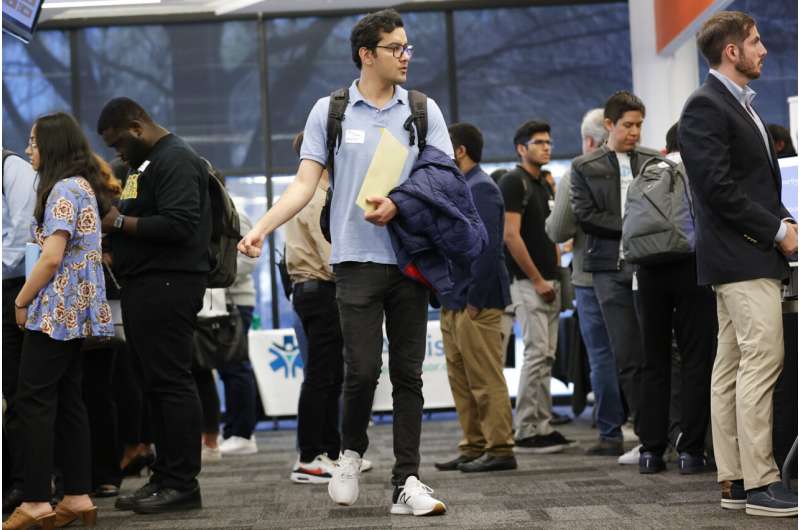 Georgia Tech student Sajad Abavisani, center, walks through the Startup Student Connection job fair, Wednesday, March 29, 2023, in Atlanta. For the thousands of workers who'd never experienced upheaval in the tech sector, the recent mass layoffs at companies like Google, Microsoft, Amazon and Meta came as a shock. Now they are being courted by long-established employers whose names aren't typically synonymous with tech work, including hotel chains, retailers, investment firms, railroad companies and even the Internal Revenue Service. Credit: AP Photo/Alex Sliz Still hiring: Big Tech layoffs give other sectors an opening