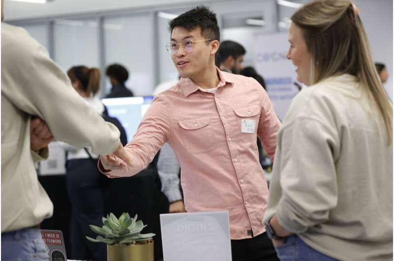 Georgia Tech student Michael Oh-Yang, center, greets company representatives during the Startup Student Connection job fair, Wednesday, March 29, 2023, in Atlanta. For the thousands of workers who'd never experienced upheaval in the tech sector, the recent mass layoffs at companies like Google, Microsoft, Amazon and Meta came as a shock. Now they are being courted by long-established employers whose names aren't typically synonymous with tech work, including hotel chains, retailers, investment firms, railroad companies and even the Internal Revenue Service.Credit: AP Photo/Alex Sliz Still hiring: Big Tech layoffs give other sectors an opening