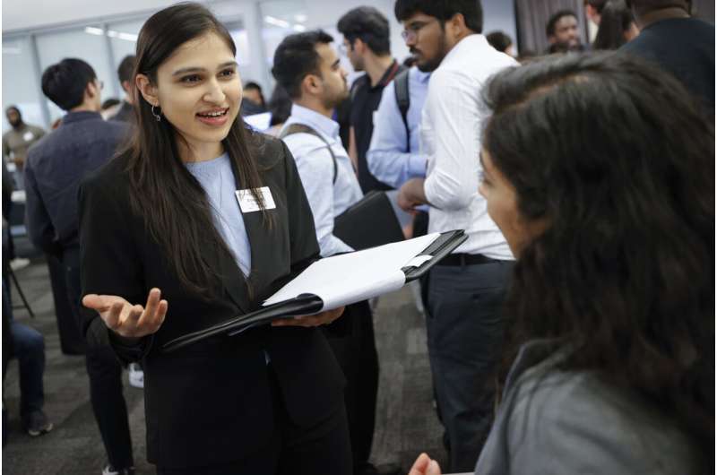 Emory University student Priyanka Somani, left, speaks with a representative of Sociallyn, a social media agency during the Startup Student Connection job fair, Wednesday, March 29, 2023, in Atlanta. For the thousands of workers who'd never experienced upheaval in the tech sector, the recent mass layoffs at companies like Google, Microsoft, Amazon and Meta came as a shock. Now they are being courted by long-established employers whose names aren't typically synonymous with tech work, including hotel chains, retailers, investment firms, railroad companies and even the Internal Revenue Service. Credit: AP Photo/Alex Slitz Still hiring: Big Tech layoffs give other sectors an opening