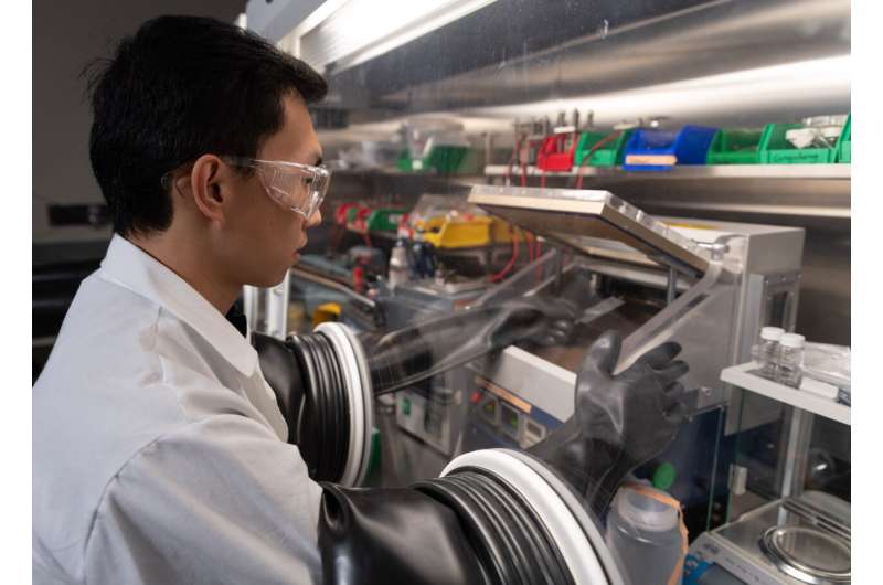 Postdoctoral researcher Dr. Congcheng Wang builds a battery cell. Credit: Georgia Institute of Technology Aluminum materials show promising performance for safer, cheaper, more powerful batteries