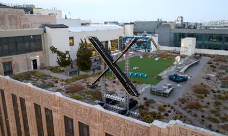 Musk removes giant, flashing X sign after furor