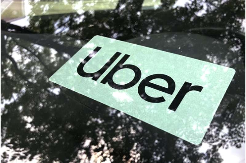 An Uber sign is displayed inside a car in Palatine, Ill., Monday, May 22, 2023. The Ride-hailing company Uber announced Aug. 24, 2023, that it will raise the minimum age for drivers who will transport others to 25. Credit: AP Photo/Nam Y. Huh,File Uber raises minimum age for most California drivers to 25, saying insurance costs are too high
