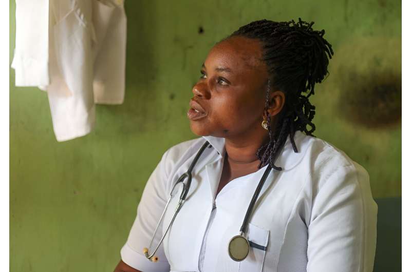 Nurse Andat Datau works at a clinic powered by solar energy in Sabon Gida village. Nurse Andat Datau works at a clinic powered by solar energy in Sabon Gida village