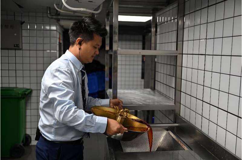 The leftover hotpot broth goes through a special filter that separates oil from water