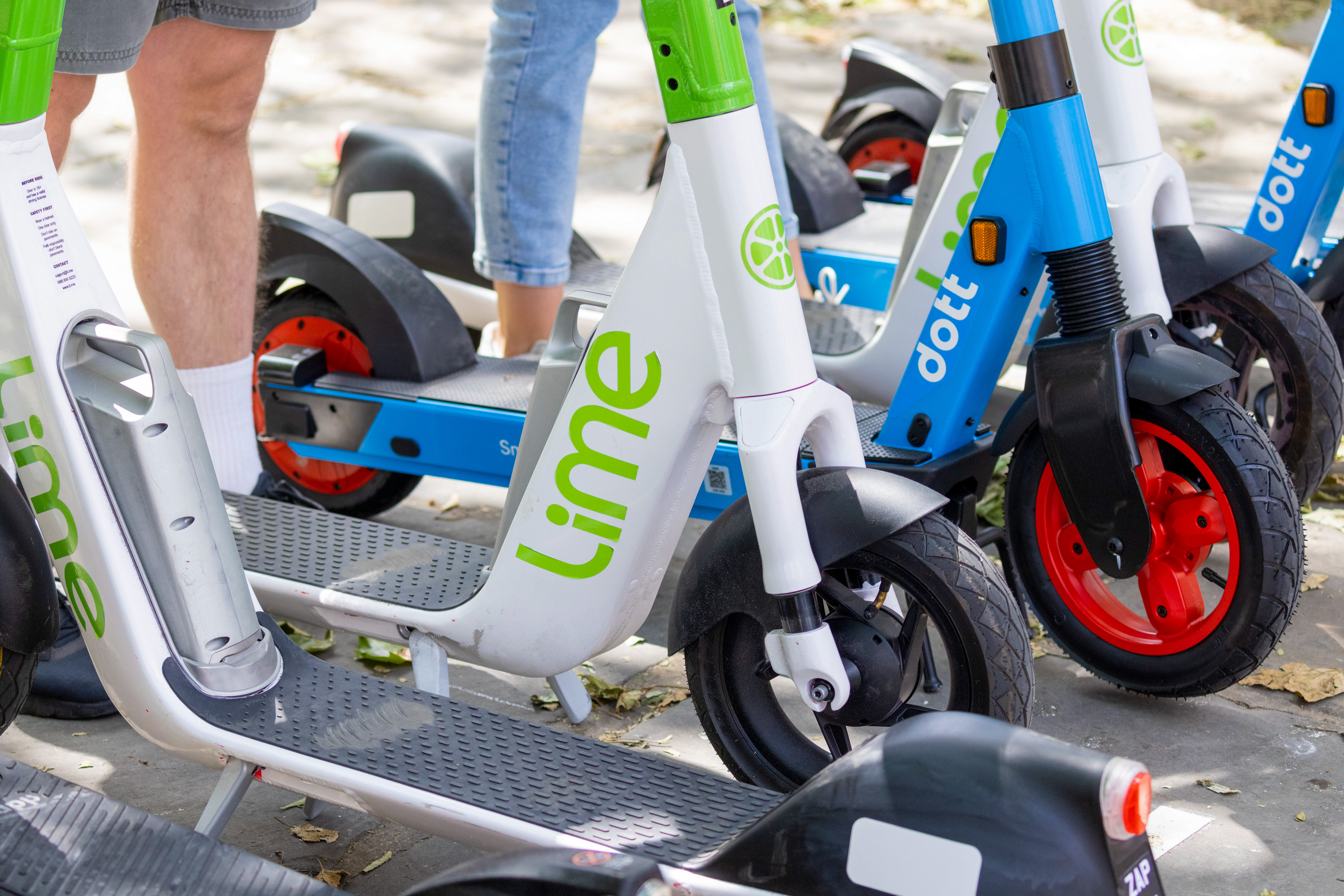 A row of e-scooters