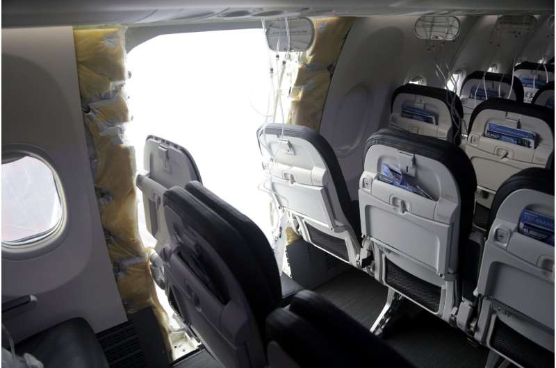 This photo released by the National Transportation Safety Board shows a gaping hole where the paneled-over door had been at the fuselage plug area of Alaska Airlines Flight 1282 on Sunday, Jan. 7, 2024, in Portland, Ore. A panel used to plug an area reserved for an exit door on the Boeing 737 Max 9 jetliner blew out Jan. 5, shortly after the flight took off from Portland, forcing the plane to return to Portland International Airport. Credit: National Transportation Safety Board via AP A look at recent crashes and safety problems involving Boeing planes
