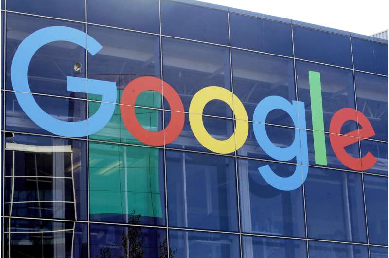A sign is shown on a Google building at their campus in Mountain View, Calif., on Sept. 24, 2019. Reddit struck a deal with Google that allows the search giant to use posts from the online discussion site for training its artificial intelligence models and to improve products such as online search. Credit: AP Photo/Jeff Chiu, File Reddit strikes $60M deal allowing Google to train AI models on its posts, unveils IPO plans