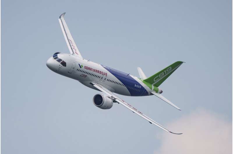 A China's COMAC C919 aircraft flies during the first day of the Singapore Airshow in Singapore, Tuesday, Feb. 20, 2024. Credit: AP Photo/Vincent Thian Singapore Airshow features aerial displays and the international debut of China's C919