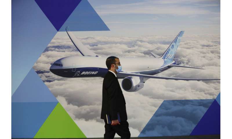 Singapore Airshow features aerial displays and the international debut of China's C919