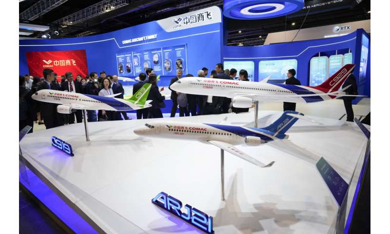 Singapore Airshow features aerial displays and the international debut of China's C919