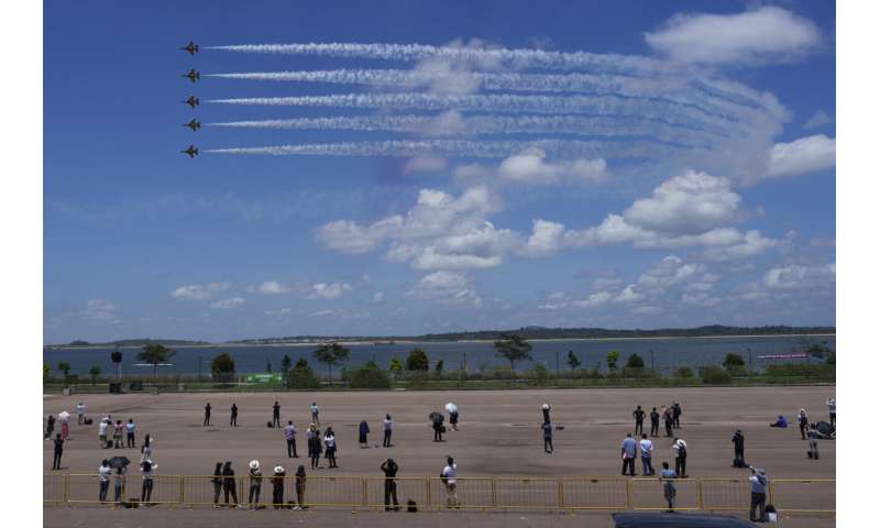 Singapore Airshow features aerial displays and the international debut of China's C919