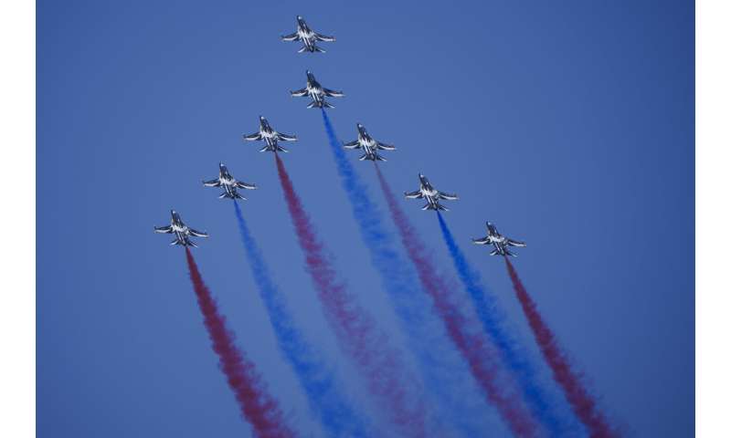 Singapore Airshow features aerial displays and the international debut of China's C919