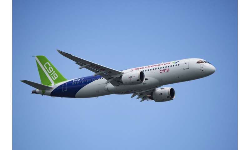 Singapore Airshow features aerial displays and the international debut of China's C919