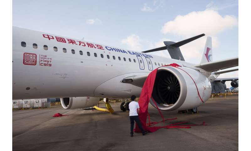 Singapore Airshow features aerial displays and the international debut of China's C919