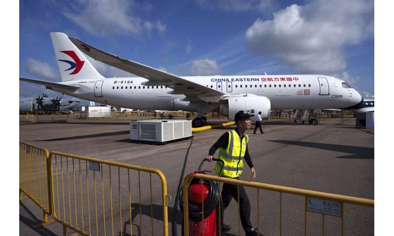 Singapore Airshow features aerial displays and the international debut of China's C919