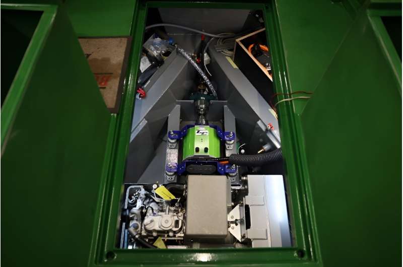 The electric motor of a hybrid narrowboat made in the workshop of manufacturer Ortomarine