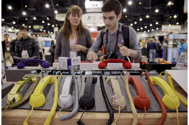 Cell phone hand sets are seen on display at the 2012 International Consumer Electronics show, Friday, Jan. 13, 2012, in Las Vegas. As Thursday, Feb. 22, 2024, cell phone outage shows, sometimes landline telephones can come in handy, and were suggested as part of the alternatives when people's cell phones weren't working. Credit: AP Photo/Julie Jacobson This week's cellphone outage makes it clear: In the United States, landlines are languishing